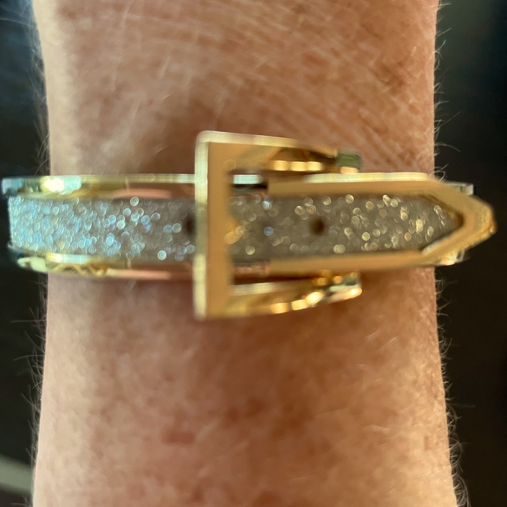 Gold and silver colored buckle bracelet